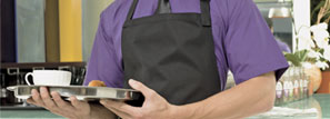 Image of waiter wearing an apron and hold a tray